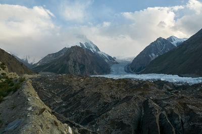 Scenic view of snowcapped mountains against sky