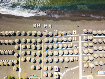 Row of chairs on beach