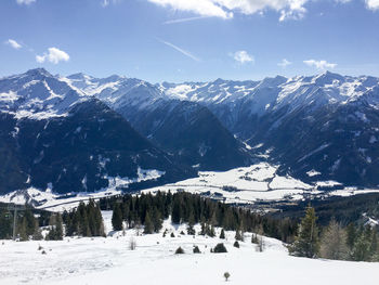 Scenic view of snow covered mountains