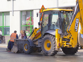 Man working at construction site in city