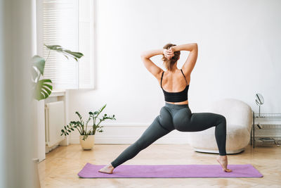 Woman exercising in gym