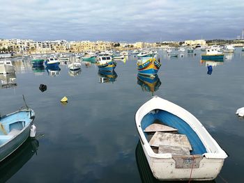 High angle view of boats moored at harbor