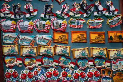 Low angle view of multi colored decoration hanging on wall