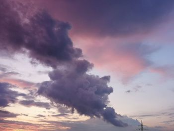 Low angle view of dramatic sky during sunset