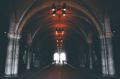 Man in illuminated corridor