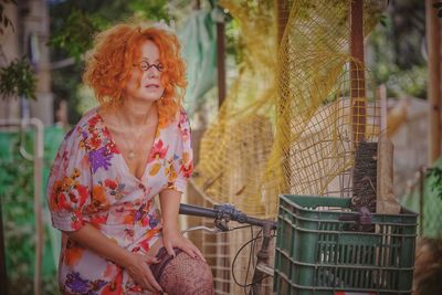 Woman standing in basket
