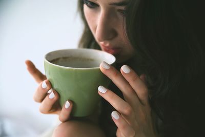 Close-up of woman holding hands