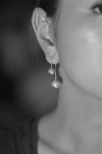 Close-up of woman wearing earring