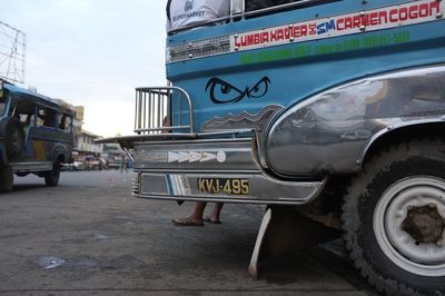 Car in city against sky