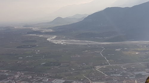 Aerial view of mountains against sky