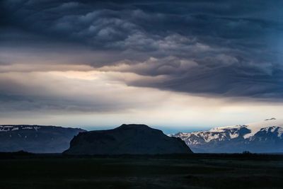 Scenic view of mountains against sky during winter