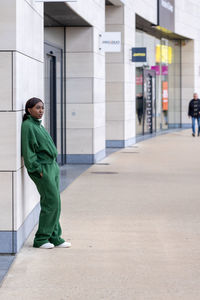 Low angle view of man standing on street