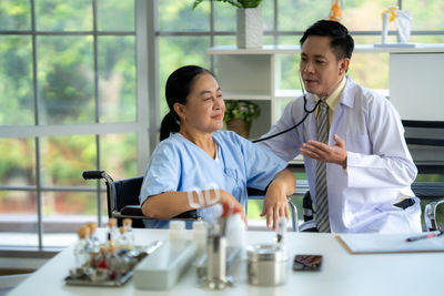 Portrait of man working at clinic