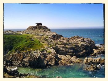 Scenic view of sea against clear sky