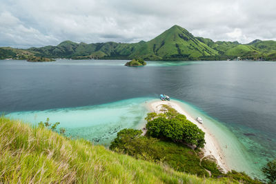 Stunning view on the green-capped mountains of komodo island