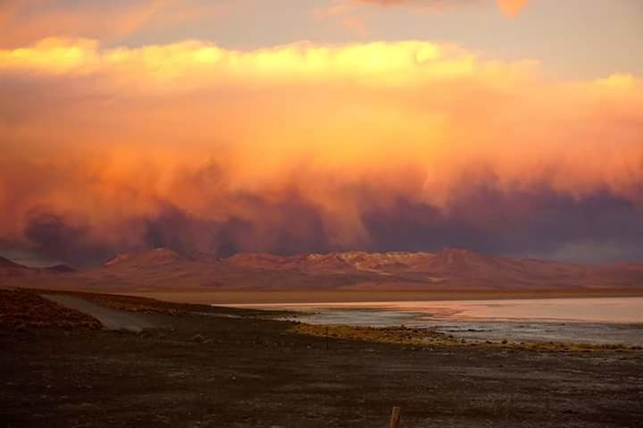 PANORAMIC VIEW OF LANDSCAPE AGAINST CLOUDY SKY