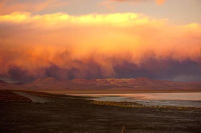 View of landscape against cloudy sky