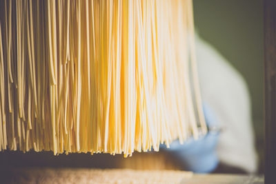 Close-up of spaghetti in factory