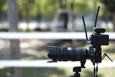 Close-up of camera photographing