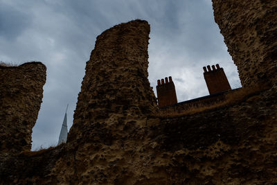 Low angle view of historic building against sky
