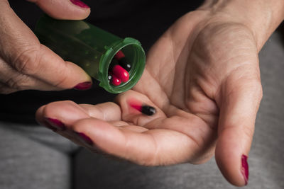 Close-up of woman holding hands