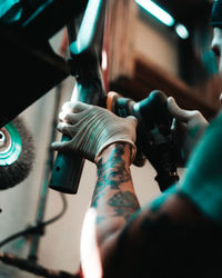 Polishing a cage for a car.