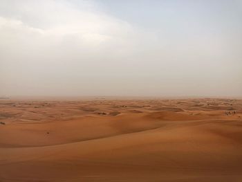 Scenic view of desert against sky