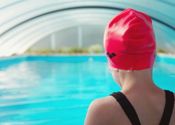 Portrait of man swimming in pool