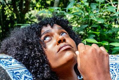 Portrait of woman looking at camera