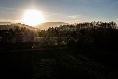 Scenic view of landscape against sky during sunset