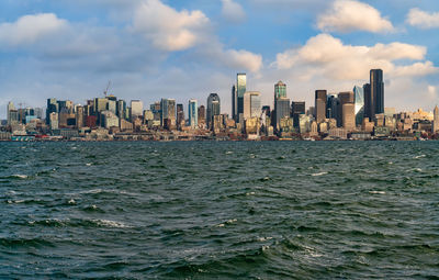 A view of the seattle skyline on a windy day.