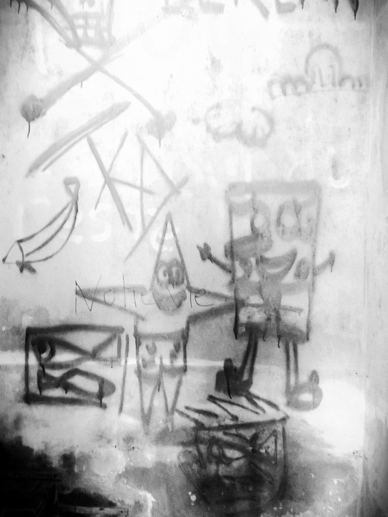 indoors, table, glass - material, text, western script, still life, transparent, communication, window, no people, wall - building feature, close-up, reflection, day, empty, absence, auto post production filter, wall, water, chair