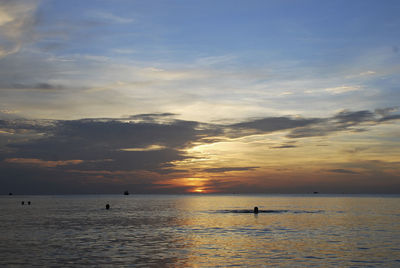 View of calm sea at sunset