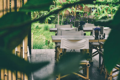 Empty chairs and tables in park