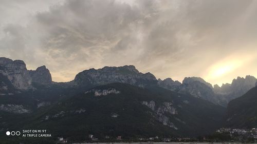 Scenic view of mountains against sky during sunset