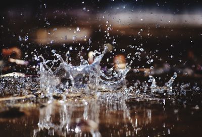 Close-up of water splashing in lake