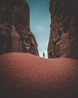 Man standing on rock formation