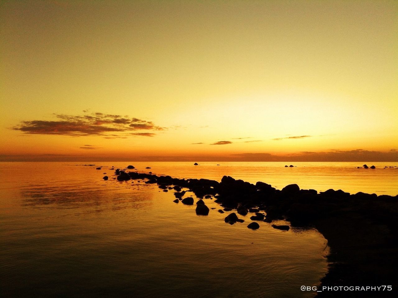 sunset, water, sea, orange color, scenics, tranquil scene, tranquility, beauty in nature, horizon over water, silhouette, idyllic, nature, reflection, sky, sun, waterfront, copy space, nautical vessel, outdoors, clear sky