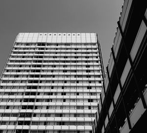 Low angle view of modern buildings against clear sky