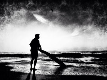 Woman standing on beach