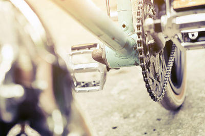 Close-up of bicycle on road