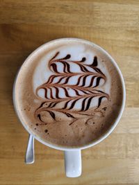 Close-up of coffee cup on table
