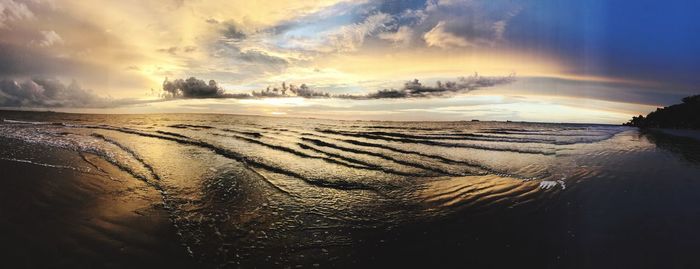 Panoramic view of beach against sky