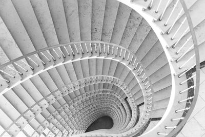 Directly below shot of spiral staircase in building