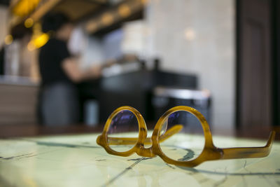 Close-up of eyeglasses on table