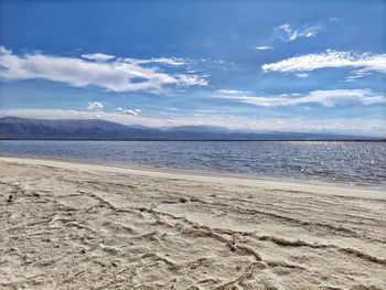 Scenic view of beach against sky