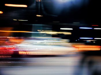 Blurred motion of illuminated car at night