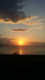 Scenic view of sea at sunset