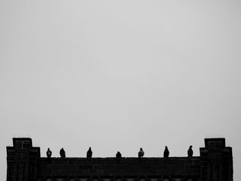 Low angle view of built structure against clear sky