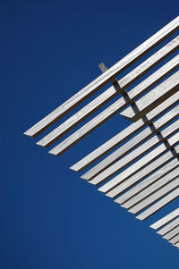 Low angle view of building against clear blue sky